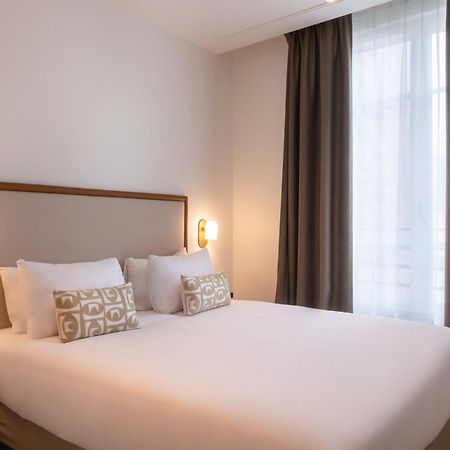 Le Lampika Hotel París Habitación foto